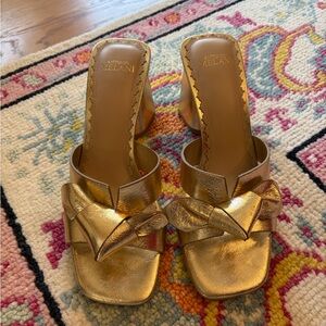 ANTONIO MELANI Metallic Gold Knotted Mule Heels